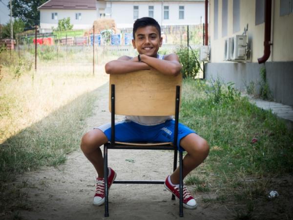 child sitting on a chair