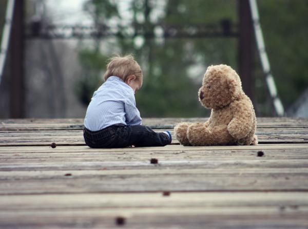 small boy with a teddy bear