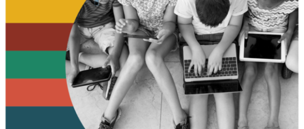children in front of a laptop