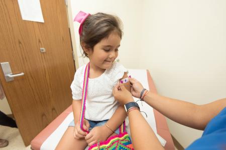 Child getting vaccine 