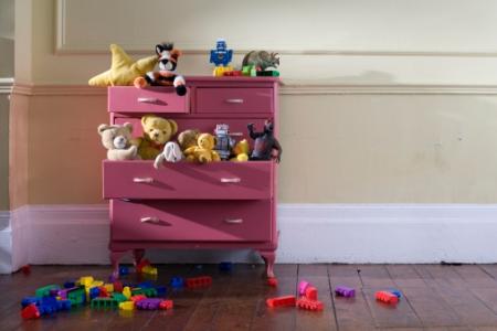 A cupboard with toys