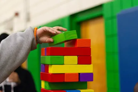 Kid playing with building blocks