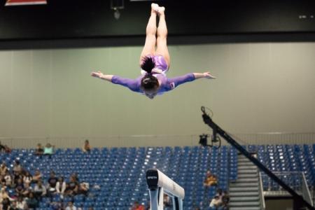  gymnast in mid-air during excercise